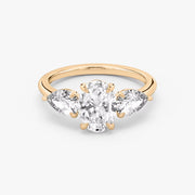Oval Cut - Plain Band - Three Stone Ring- 0.5 Ct Side Stone each - 18 K Gold